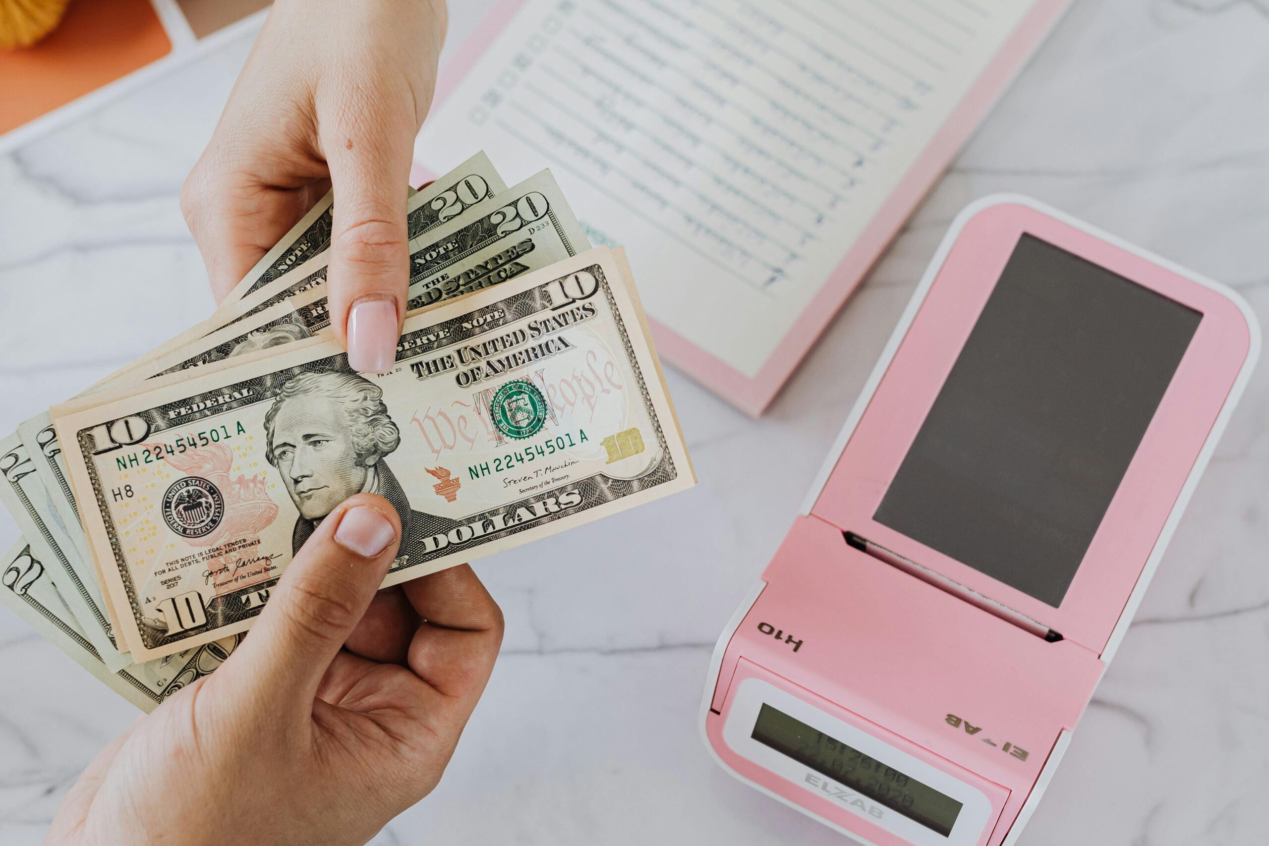 handing over money representing paying of debt