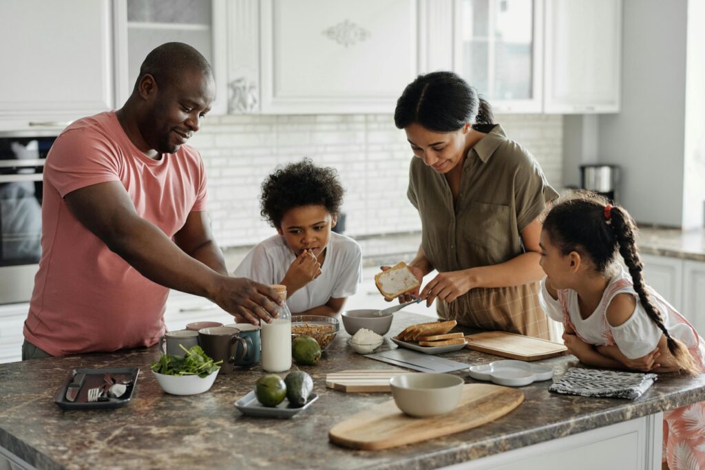 family: parents and kids making meal